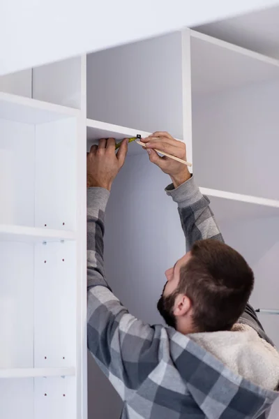 Assembly of a wardrobe